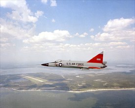 Air-to-air left side view of a PQM-102A Delta Dagger aircraft