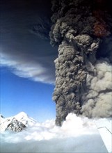 1992 - Roiling eruption column rising from Crater Peak vent of Mt. Spurr volcano. View from the south.