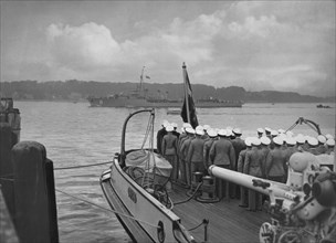 German sailors in Kiel watch the destroyer ORP "Burza" passing ca. 1935