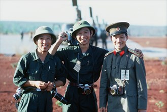 Two Viet Cong and a North Vietnamese Army officer