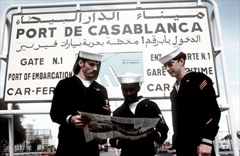 U.S. Sailors look at their map at the entrance to Port De Casablanca