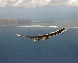 Pathfinder in flight over Hawaii - Pathfinder, NASA's solar-powered, remotely-piloted aircraft is shown while it was conducting a series of science flights to highlight the aircraft's science capabili...