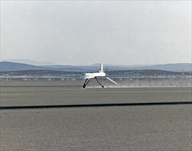 Altus I aircraft landing on Edwards lakebed runway 23 ca. 1997