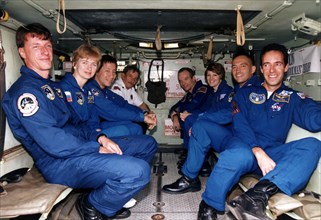 The STS-84 crew gets a ride in an M-113 armored personnel carrier while participating in Terminal Countdown Demonstration Test (TCDT) activities at Launch Pad 39A ca. 1997