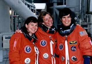 STS-83 Alternate Mission Specialist Catherine "Cady" Coleman, Pilot Susan L. Still and Payload Commander Janice Voss mug for the camera at the 195-foot level of Launch Pad 39A during Terminal Countdow...
