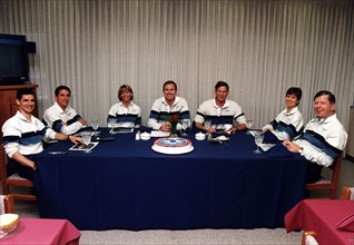 The STS-83 flight crew enjoys the traditional pre-liftoff breakfast in the crew quarters of the Operations and Checkout Building ca. 1997