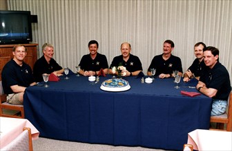 As part of the final STS-82 prelaunch activities, the seven crew members gather for lunch and a photo opportunity in the Operations and Checkout Building ca. 1997