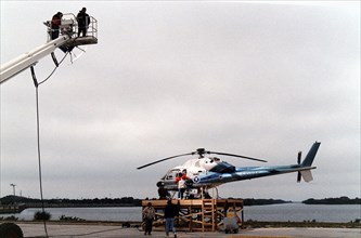 Warner Bros.' cast and crew are filming scenes for the movie "Contact" at Kennedy Space Center's Launch Complex 39 ca. 1997