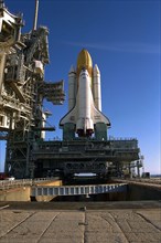 Atop the crawler/transporter, the Space Shuttle orbiter Atlantis rolls out to Launch Complex 39A in preparation for mission STS-86 ca. 1997
