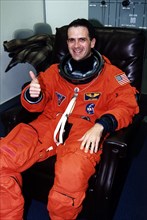 STS-81 Mission Specialist Peter J. K. "Jeff" Wisoff prepares for the fifth ShuttleMir docking as he waits in the Operations and Checkout (O&C) Building ca. 1997