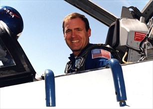 STS-83 Mission Commander James D. Halsell, Jr. arrives at Kennedy Space Center's Shuttle Landing Facility aboard a T-38 prior to Columbia's launch ca. 1997