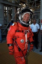 Dressed in his orange launch and entry spacesuit, STS-86 Mission Specialist Jean-Loup J.M. Chretien of the French Space Agency, CNES, participates in Terminal Countdown Demonstration Test (TCDT) activ...