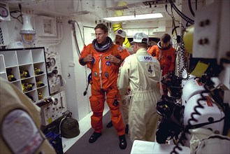 STS-94 Mission Specialist Michael L. Gernhardt prepares to enter the Space Shuttle Columbia at Launch Pad 39A in preparation for launch ca. 1997
