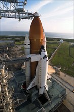 The Space Shuttle Atlantis is poised for liftoff on the STS-86 mission from Launch Pad 39A ca. 1997