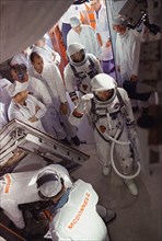 (21 Aug. 1965) --- Astronauts L. Gordon Cooper Jr. (foreground) and Charles Conrad Jr. arrive in the white room at Pad 19 during the Gemini-5 countdown at Cape Kennedy, Florida