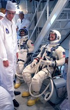 (091066) - Gemini 11 Astronauts Charles Conrad Jr., (right), command pilot, and Richard F. Gordon Jr., (left), pilot, talk with technicians in the White Room atop Pad 19 during Gemini 11 countdown