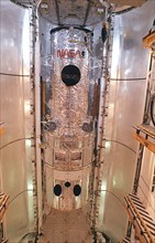 1990 - This photograph shows the Hubble Space Telescope (HST) installed in the cargo bay of the Space Shuttle Orbiter Discovery for the STS-31 Mission