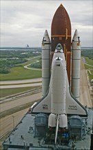1992 - One step closer to its maiden voyage, the Space Shuttle Orbiter Endeavour rolls out of the Vehicle Assembly Building, headed to Launch Pad 39B.