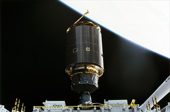 1992 - The 4.5 ton INTELSAT VI was successfully snared by three astronauts on a third EVA. In this photo, the satellite, with its newly deployed perigee stage, begins its separation from the Shuttle.