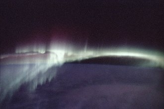 1992 - This photograph of aurora borealis, northern aurora, was taken during the Spacelab-J (SL-J) mission (STS-47).