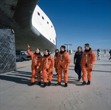 1991 - STS-37 crewmembers inspect the underside of Atlantis, OV-104, at EAFB
