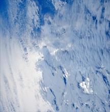STS-39 Earth observation shows scattered cloud cover over an ocean