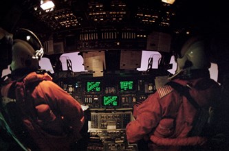 1992 - STS-42 Commander Grabe and Pilot Oswald at OV-103's controls during reentry
