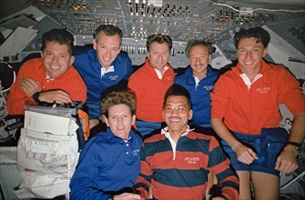 STS-45 crew poses for onboard (in-space) portrait on OV-104's flight deck