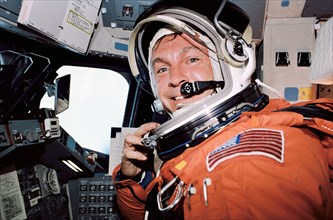 (20 Sept. 1992) --- Astronaut Curtis L. Brown, Jr., STS-47 pilot, is photographed at the Space Shuttle Endeavour's pilot station about ten minutes after main engine cutoff on launch day of the eight-d...