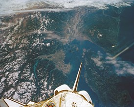 (12 - 20 Sept 1992) --- In this large format camera image, the forested Cascade Range appears along the left side; the Pacific Ocean, on the right. The frame was photographed as the Space Shuttle Ende...
