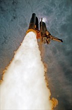 STS-50 Columbia, OV-102, soars into the sky after KSC liftoff ca. 1992