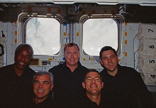 In orbit crew group portrait in the aft flight deck.