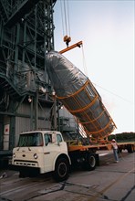 1998 - Arriving in the early morning hours at Pad 17A, Cape Canaveral Air Station, the fairing for Deep Space 1 is lifted from the truck before being raised to its place on the Boeing Delta 7326 rocke...