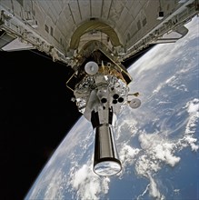 1991 - STS-44 DSP / IUS spacecraft tilted to predeployment position in OV-104's PLB