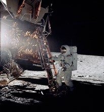 Astronaut Alan Bean steps from ladder of Lunar Module for EVA