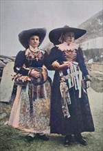 Bride and bridesmaid in the traditional dress of Val Gardena