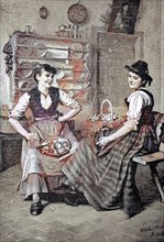 two women at the kitchen work