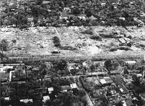 Aerial view showing houses being cleared away
