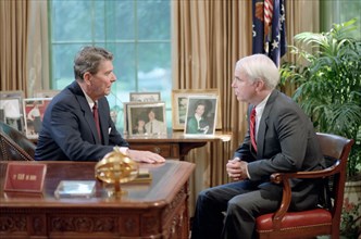President Ronald Reagan meets with John S McCain