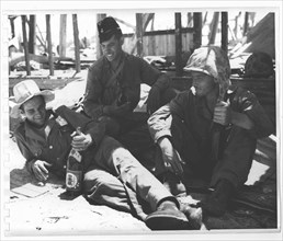 Marines relaxing after battle at Tarawa