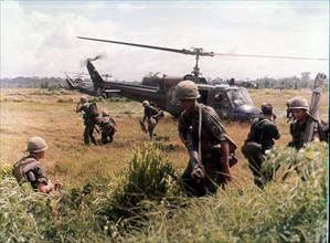 Helicopters bring in troops of 173rd Airborne Brigade during a search mission 40 Miles south of Saigon. Vietnam, 8/1965.