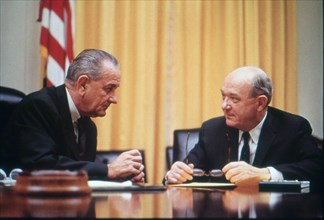 President Lyndon B. Johnson confers with Secretary of Defense Dean Rusk at the White House. Washington, DC, circa 1967.