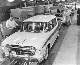Nash Ramblers on the assembly line undergoing final inspection before shipment. Kenosha, WI, 1956.