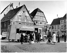 People Line Up to Visit Bookmobile, Mannheim, Germany ca. 1948-1954