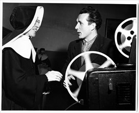 The School Teacher, in This Case a Nun, is as Keen as Her Pupils on Seeing the Films ca. 1948-1954