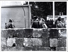 August 1961 - East German Troops and Police Group Together Behind The Wall Built By The Communists