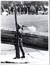 October 1961 - Communist 'People's Policemen' (Volkspolizist), Standing Between the Border Fence