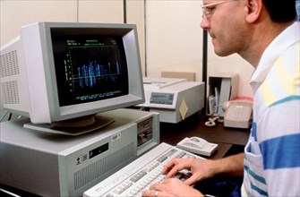 Scientist analyzing data on computer screen