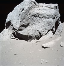 This 70mm frame features a close-up view of a large multi-cracked boulder