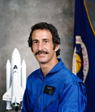 Astronaut candidate Jeffrey A. Hoffman in blue flight suit